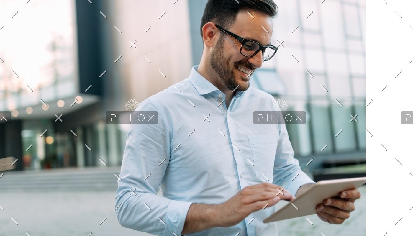 demo attachment 815 portrait of businessman in glasses holding tablet awvhcju